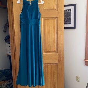 Dress is more teal than blue. Nice for a special occasion and comfy material